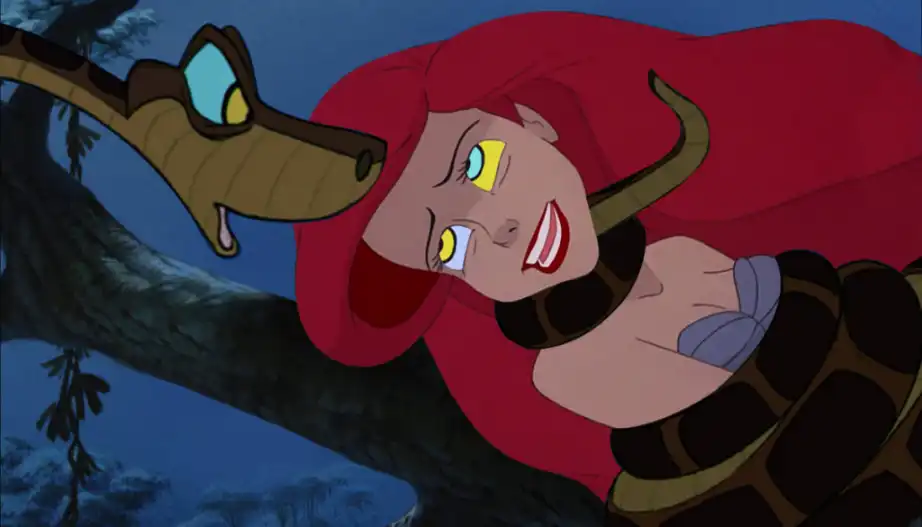 Mermaid Ariel strangled by a python