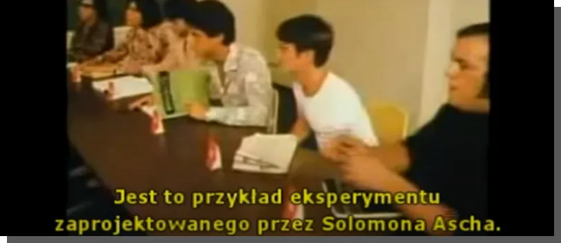 A video frame with subtitles stating, "It's an example of the experiment designed by Solomon Asch."